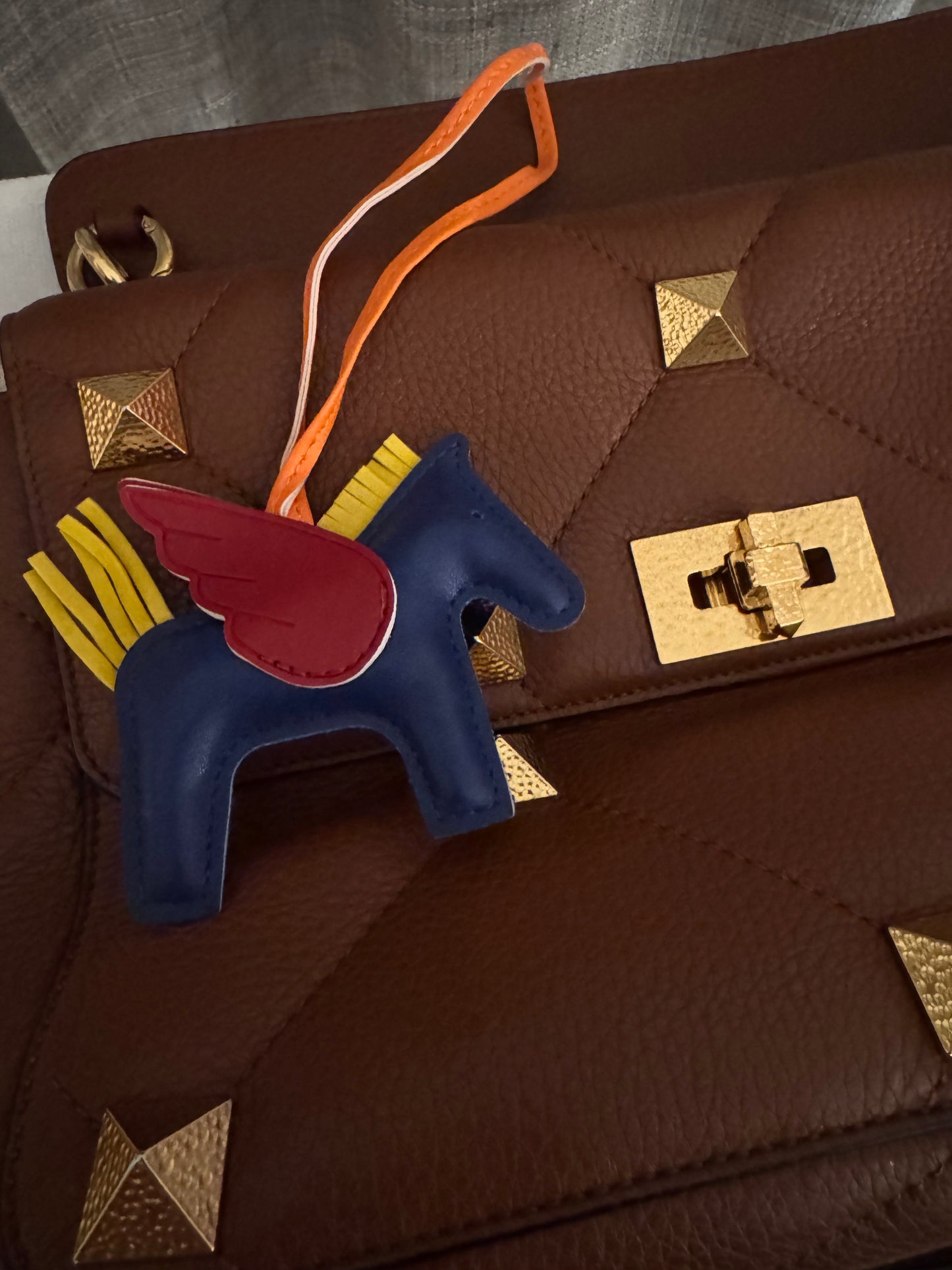 Valentino Rockstud Caramel Large with gold hammered hardware.