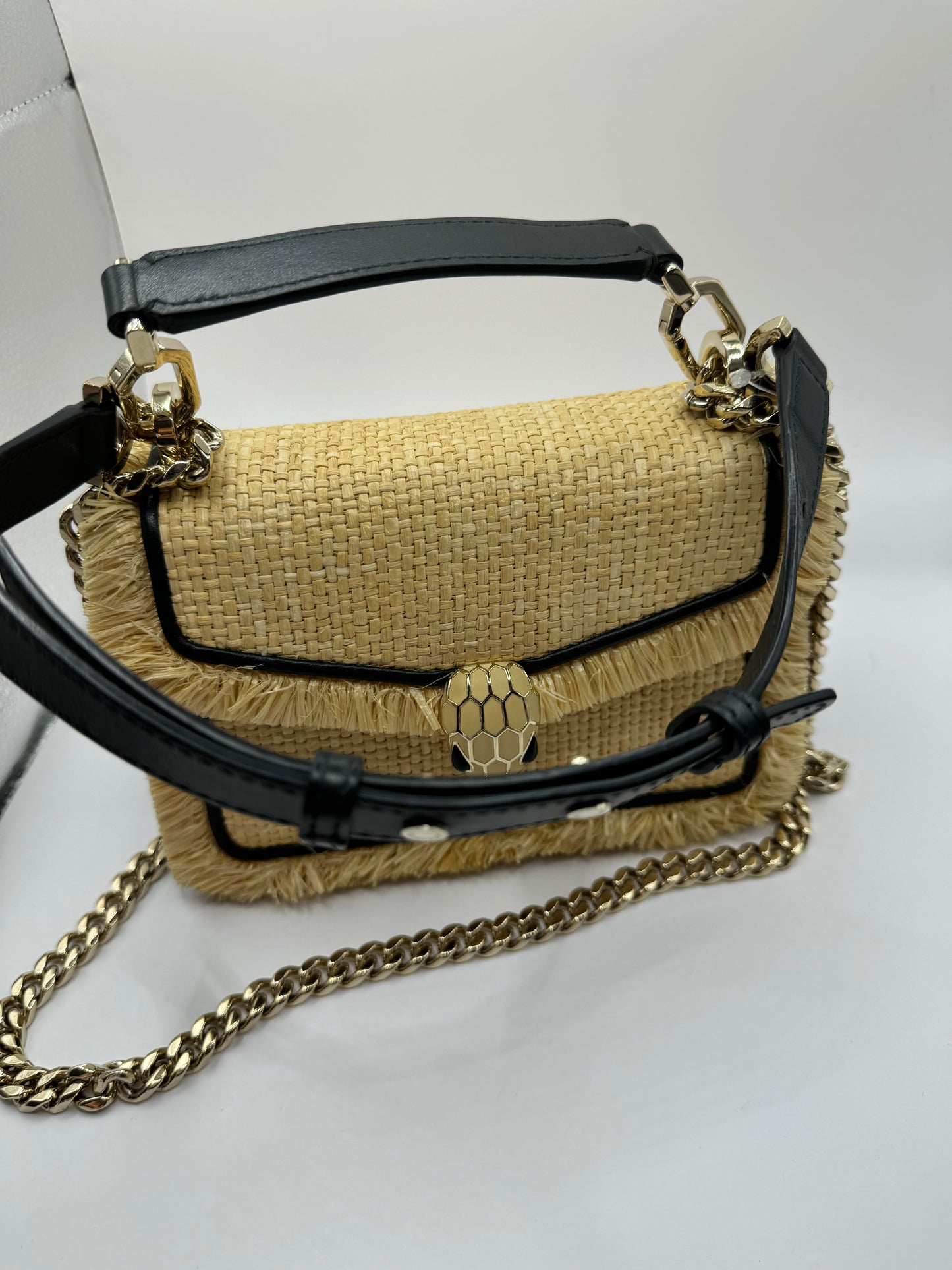 Bvlgari
Preloved raffia serpenti diamond blast crossbody/top handle bag