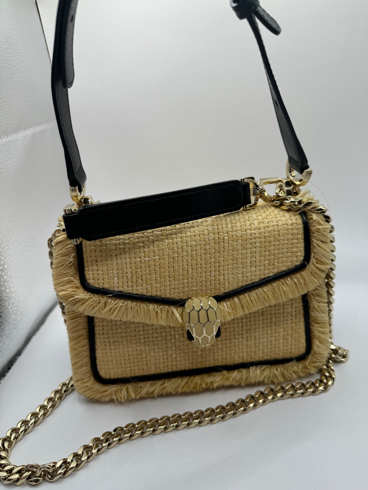 Bvlgari
Preloved raffia serpenti diamond blast crossbody/top handle bag