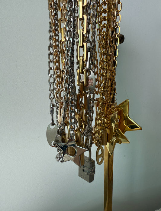 Upcycled sustainable Dior logo in gold on gold chain