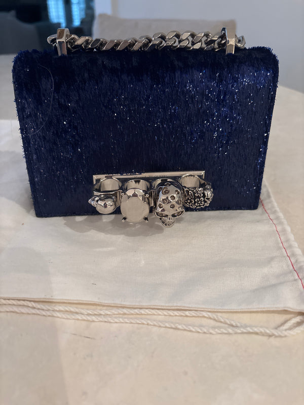 Alexander McQueen pony-hair Skull/Knuckle Box Clutch with silver hardware and a chain strap.