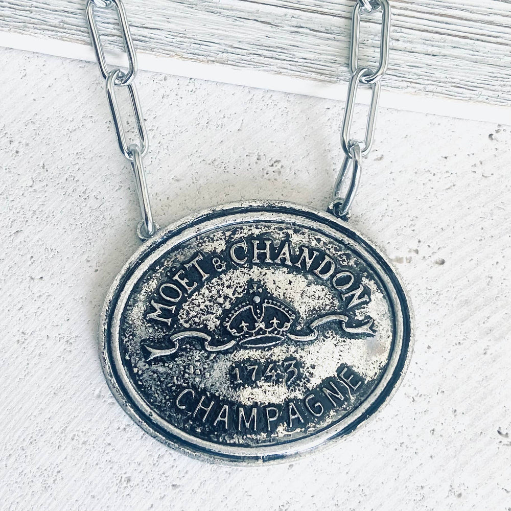 French coin, champagne label statement necklace: Burnished silver