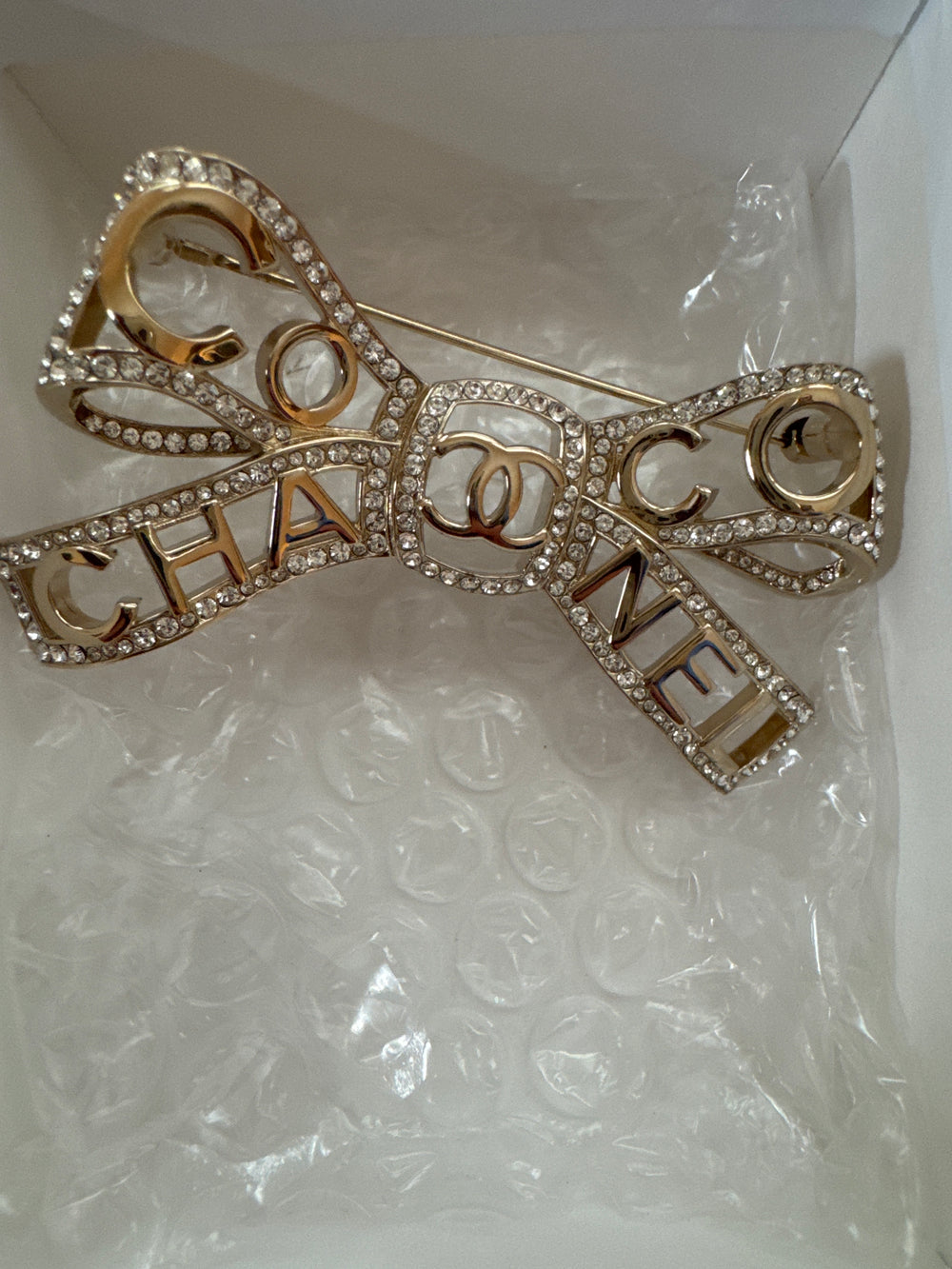 Chanel Coco Brooch/pin Ribbon motif CC Rhinestone
