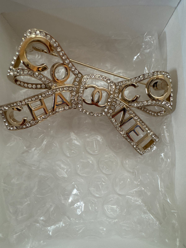 Chanel Coco Brooch/pin Ribbon motif CC Rhinestone