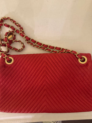 Chanel Red Medium Wrinkled calf leather Quilted Chevron Medallion Charm Surpique Flap
