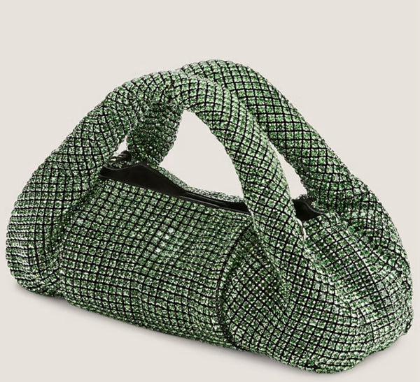 Stuart Weitzman, Crystal Moda shine bag in light green.