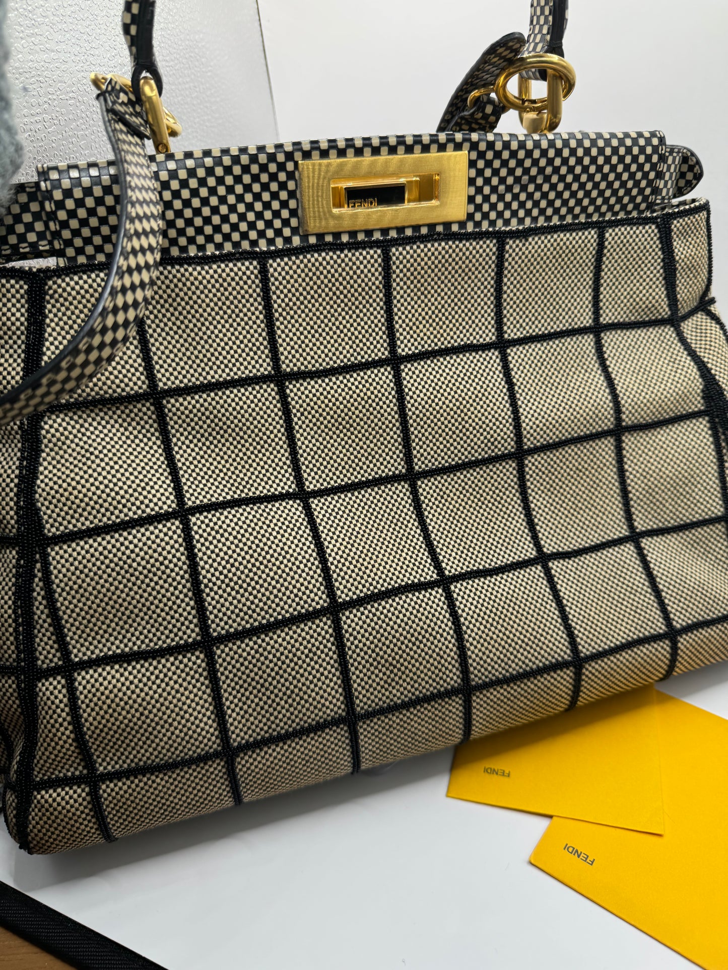 Fendi EXCLUSIVE Beige, and black. Hannah beaded with floral peekaboo top handle with Crossbody strap.