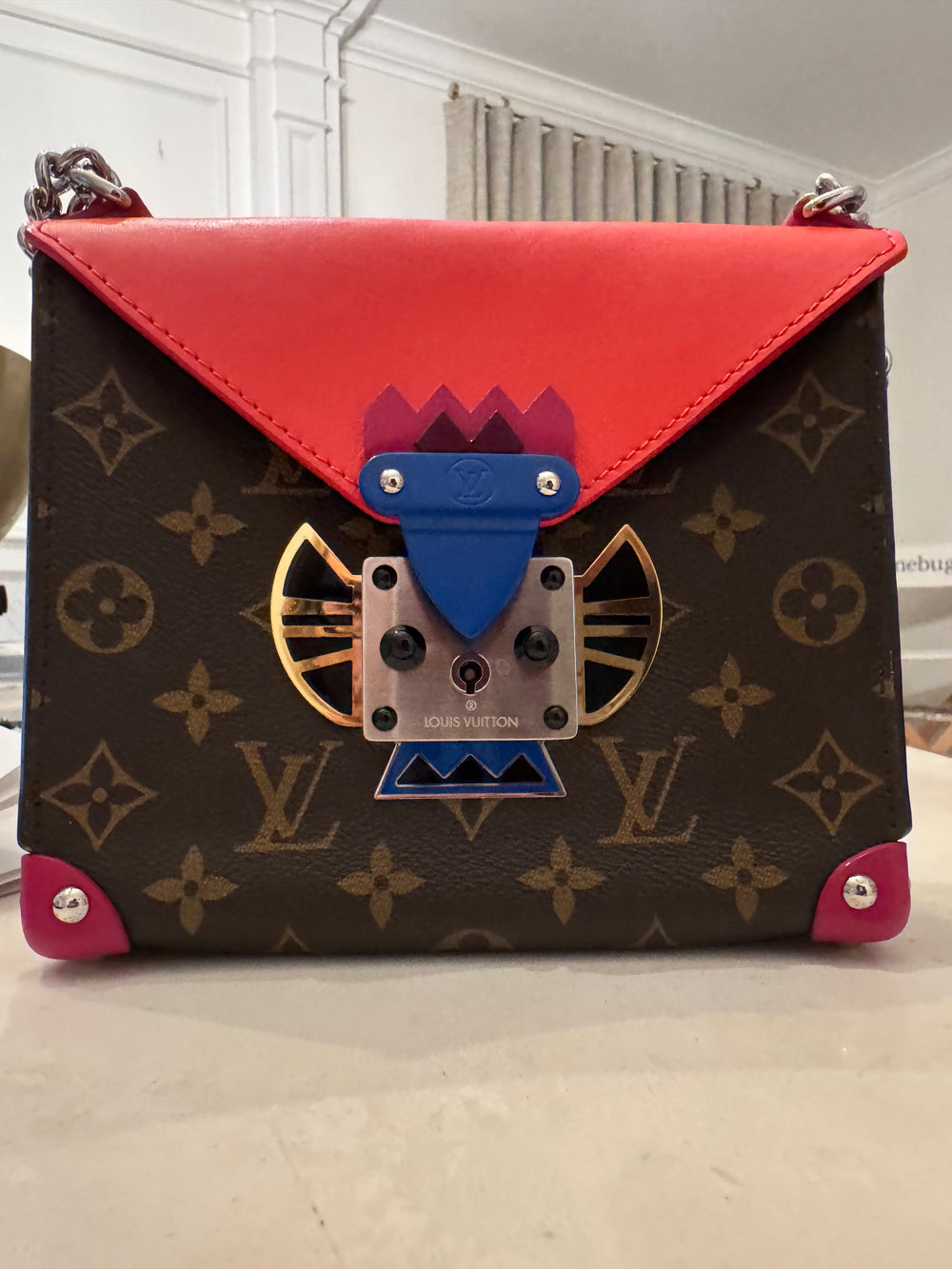 Monogram Pochette Mask PM Corail