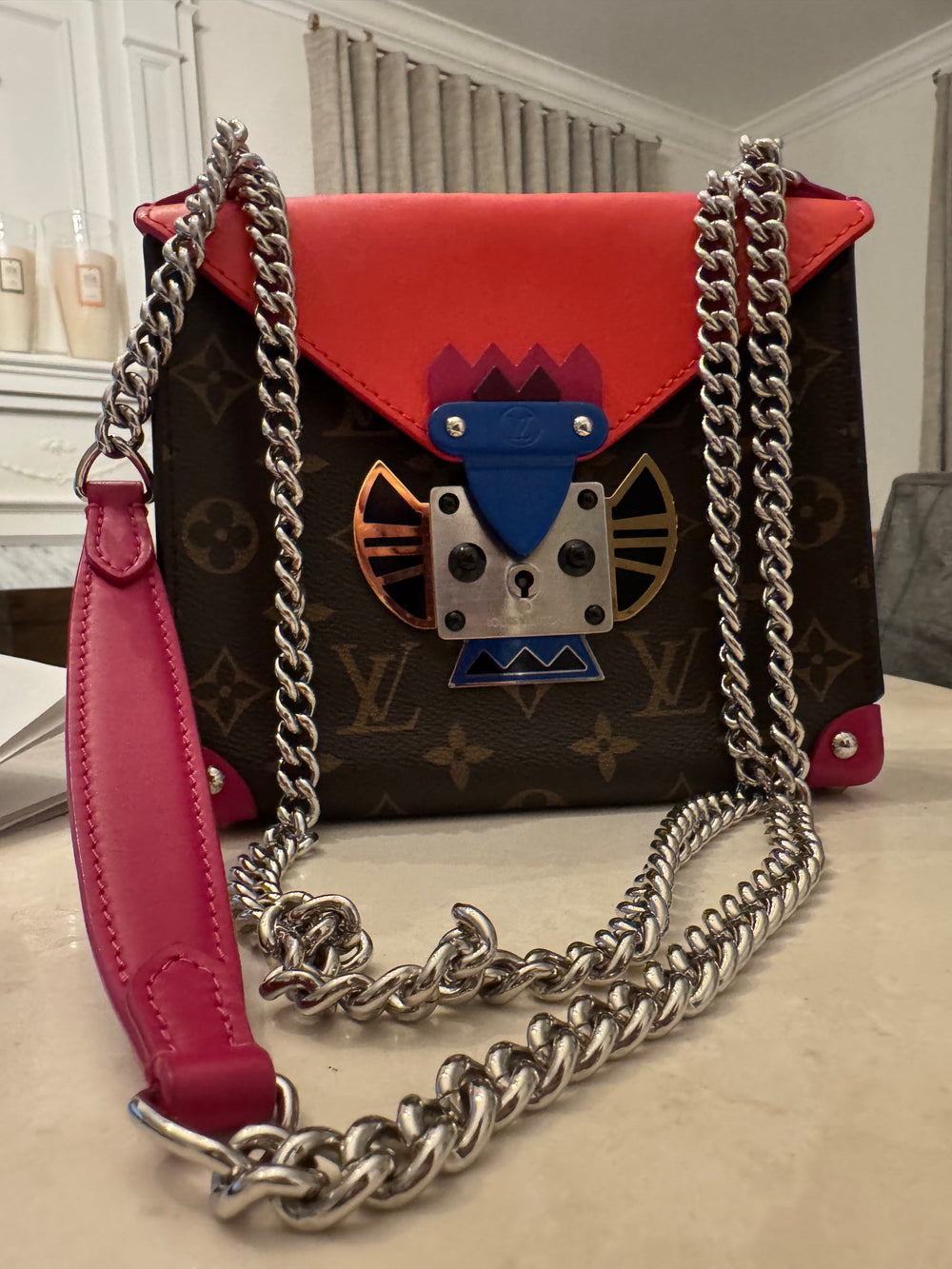 Monogram Pochette Mask PM Corail