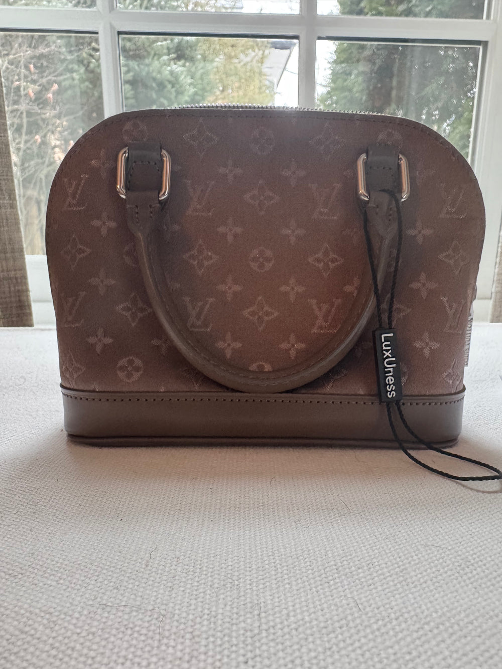 LOUIS VUITTON
Taupe Satin Monogram Mini Alma Nano