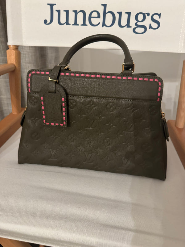 Louis Vuitton
Monogram Empreinte Vosges MM