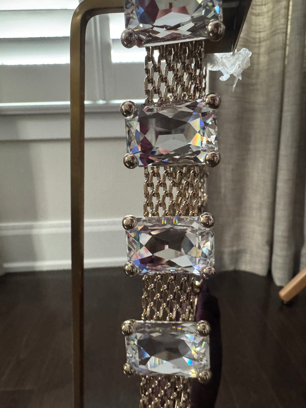 VALENTINO GARAVANI
Dark purple satin kiss logo clutch with embellished strap