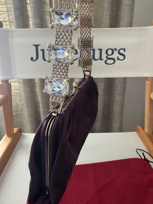 VALENTINO GARAVANI
Dark purple satin kiss logo clutch with embellished strap