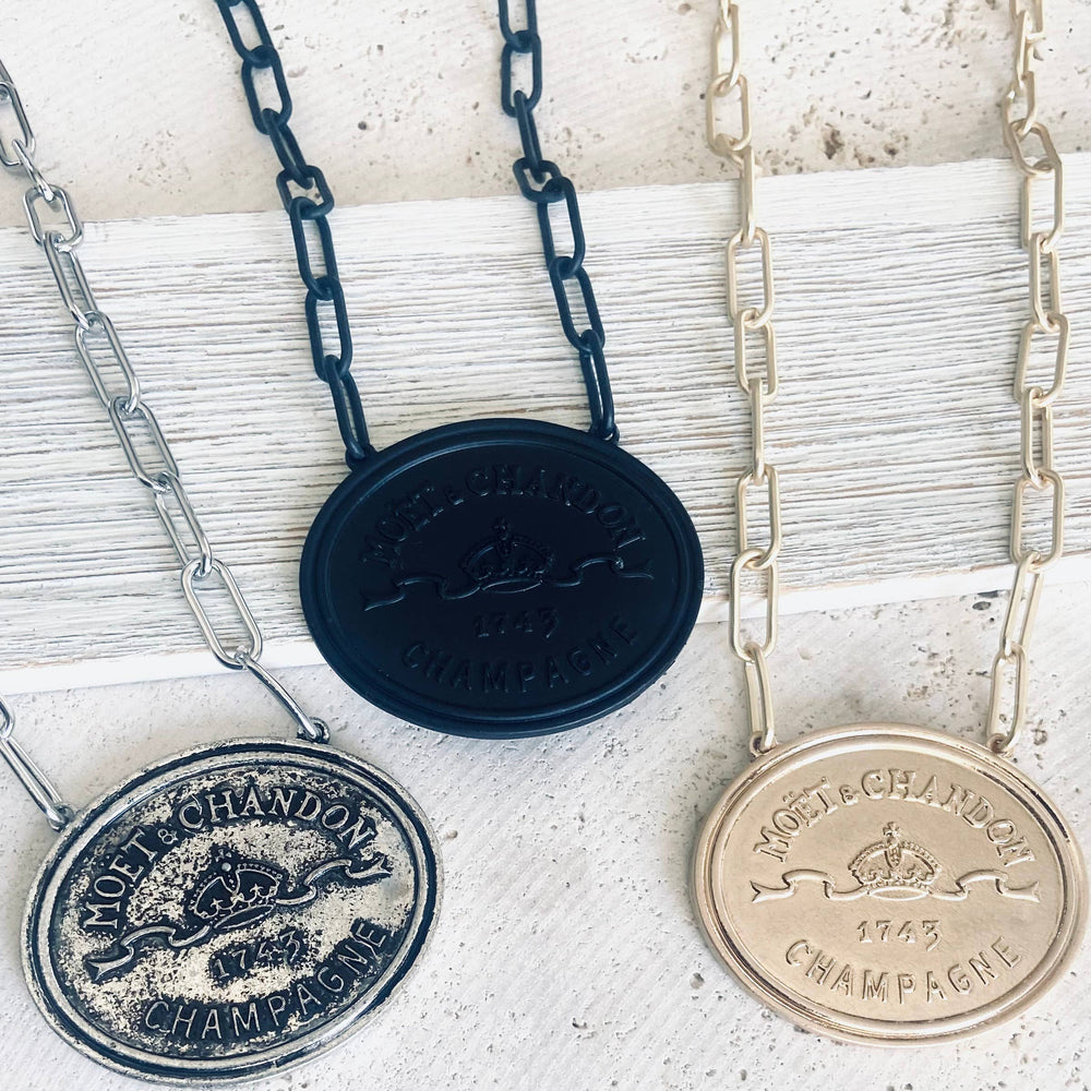 French coin, champagne label statement necklace: Burnished silver