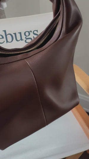 Valentino Rockstud hobo leather handbag
Valentino Garavani